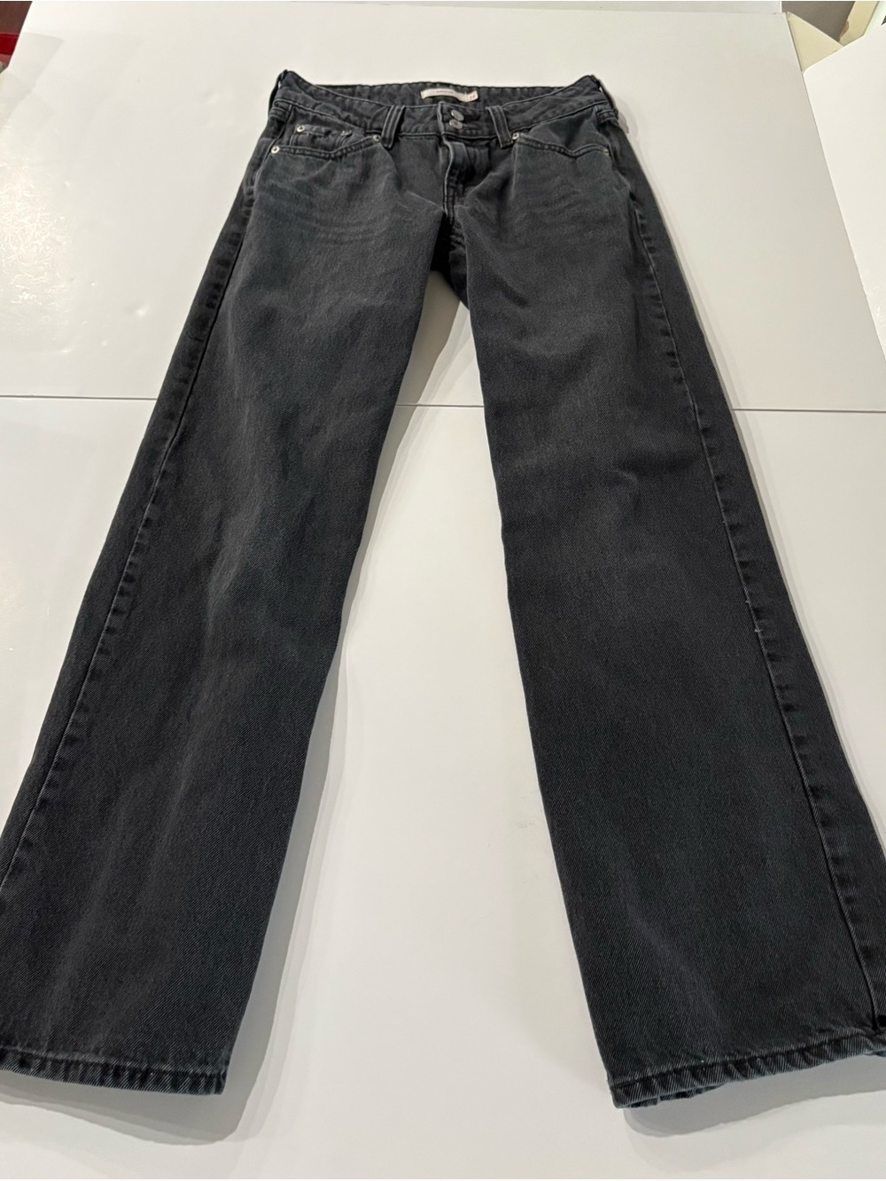 Levi’s Essentials Women’s black Suoerlow Loose Jeans, size 26